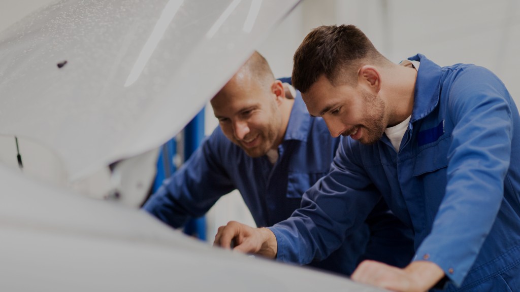IMI certified mechanics working on a vehicle at Pickwell Auto Centre, Reading